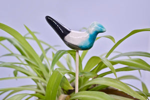 Sandstone bird (on wooden spike) 